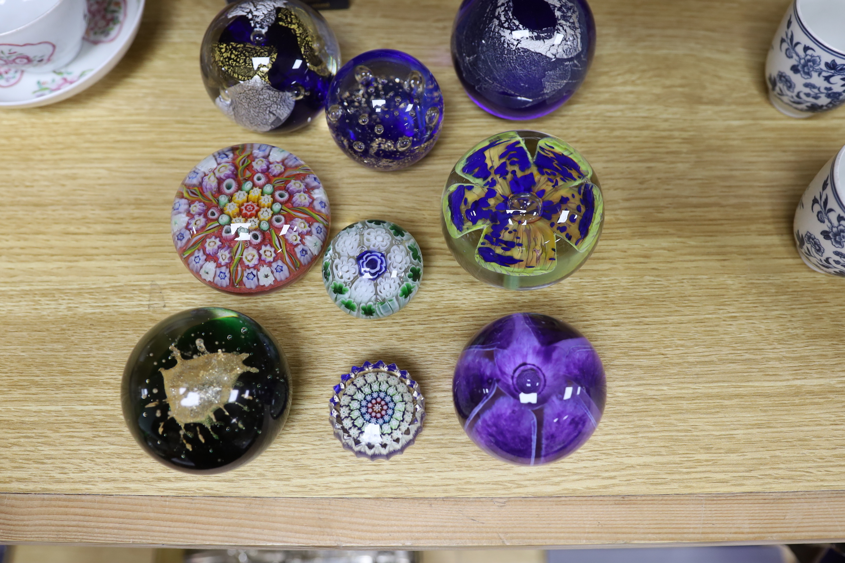 A selection of thirteen mixed decorative paperweights
